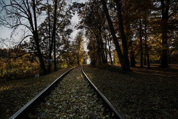 Fototapeta premium Abandoned railway in autumn through countryside
