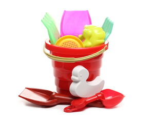 Beach toys for kids, plastic bucket and tools isolated on white background © dule964