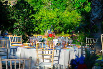 Beautiful decoration for an event or wedding with colorful flowers and table settings