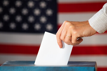 elections in the US - voting ballot and American flag
