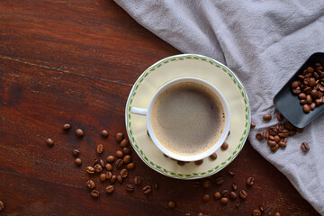 cup of coffee with beans