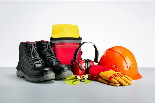 Industrial protective wear-protective shoes, safety glasses, gloves and hearing protection.