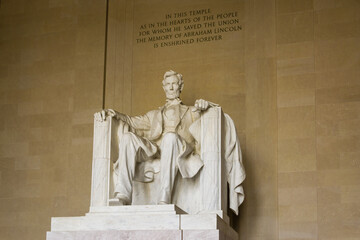Abraham LIncoln statue inside Lincoln Memorial, built to honor the 16th President of the United...