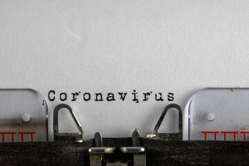  written on old typewriter with text Coronavirus. Covid-19, Coronavirus concept