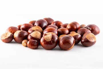isolated pile of chestnuts kastanien 