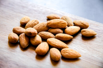 Almonds on a wooden cutting board
