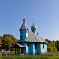 Fototapeta na wymiar wooden temple built in 2005 Orthodox church dedicated to the icon of the Mother of God multiplier of loaves in the village ravaged in Podlasie in Poland