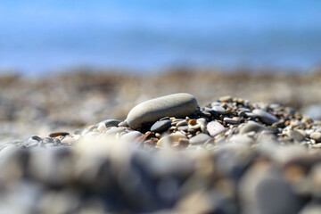 Photo background stones and pebbles on the sea beach