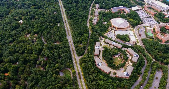 Town of Chapel Hill and University of North Carolina Overflight. The overflight shows the tree rich suburbs surrounding the University of North Carolina at Chapel Hill and downtown Chapel Hill and its