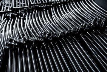 Abstract industrial background of metal pipes construction.