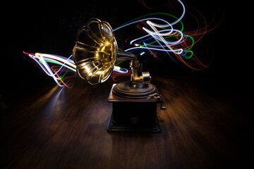 Old gramophone on a dark background. Music concept