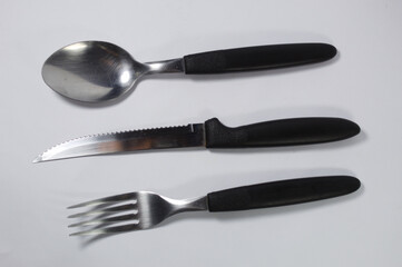 Metal cutlery on a white background