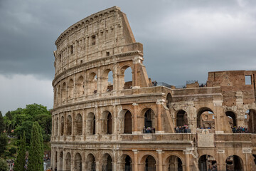 Tourists Visiting the Colosseum in Rome. The Colosseum is a major tourist attraction in Rome, Italy