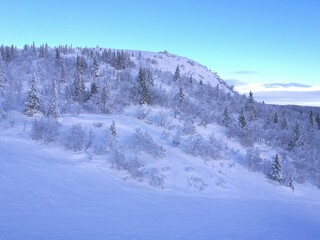 Skiing under a blue sky in the beautiful ski resort of &Aring;re (Aare) Sweden
