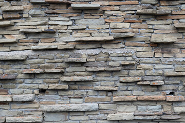 Stone brick wall tile texture.