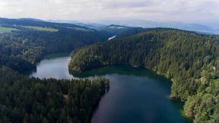 Aerial picture of a dam and its lake