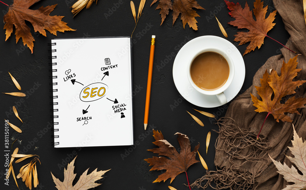 Poster Opened Notebook With Seo Scheme Lying On Black Desk Background