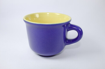 Blue cup of coffee or tea on a white background