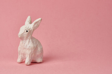 Easter bunny on a pink background toy animal holidays