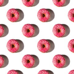 Close up view of pattern donuts sprinkled with glaze isolated on white background. Food and drink...