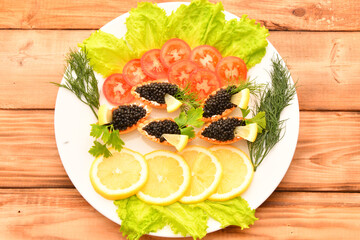 Tartlets with black caviar