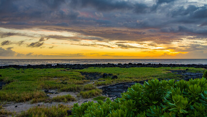 Fototapeta na wymiar Amazing sunset. Beautiful nature of Hawaii. Volcanic landscape and ocean on the horizon. Hawaii.