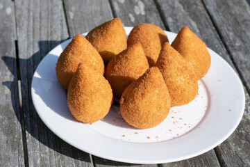Coxinhas, brazilian snacks party food, nicely served in a plate