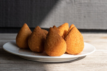 Coxinhas, brazilian snacks party food, nicely served in a plate