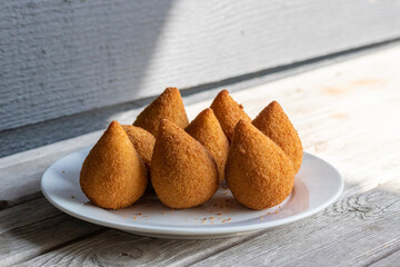 Coxinhas, brazilian snacks party food, nicely served in a plate