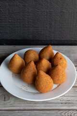 Coxinhas, brazilian snacks party food, nicely served in a plate