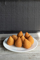 Coxinhas, brazilian snacks party food, nicely served in a plate