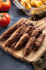 Grilled balkan cevapcici or  kebab on skewers