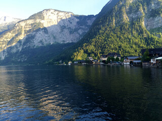 landscape of lake and mountains against blue sky at sunny day in Hallstatt Upper Austria