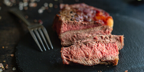 beef steak ribeye grilled bbq veal meat juicy and fried rare or medium top view copy space for text food background rustic