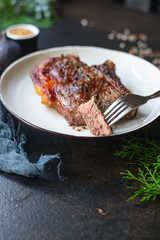 beef steak ribeye grilled bbq veal meat juicy and fried rare or medium top view copy space for text food background rustic
