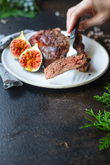 beef steak ribeye grilled bbq veal meat juicy and fried rare or medium top view copy space for text food background rustic