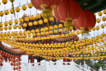 Colorful rows of yellow lanterns at a temple near Kuala Lumpur, Malaysia