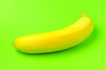 banana on a green background close-up. isolate