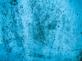 texture in blue. bright, shiny surface of unusual color. metal sheet with paint smudges, damage, corrosion and rust. texture is heterogeneous, smooth, volumetric