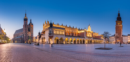 Krakow, Poland, main square night panorama with Cloth Hall and St Mary's church