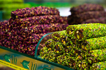 Various turkish delights sweets baklava lokum and dried fruits on market