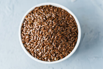 flax seed in white bowl