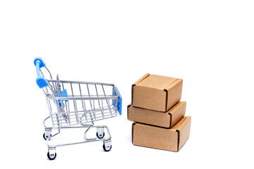 Shopping cart full of cardboard boxes, isolated on white background