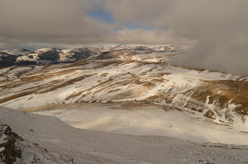 Hiking in the misty and dramatic Carpathian Mountain range in Romania, Eastern Europe