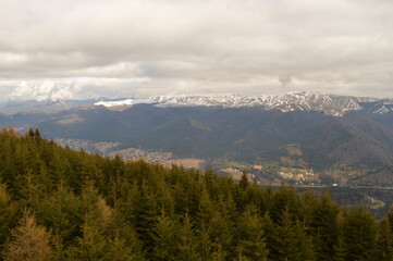 Hiking in the dramatic misty Carpathian Mountain Range in Romania, Eastern Europe