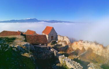 Fototapeta na wymiar Hiking in the dramatic misty Carpathian Mountain Range in Romania, Eastern Europe