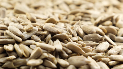 Sunflower seeds, peeled, without shell. Background of peeled not roasted seeds.