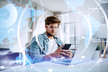 Man working remotely at home. Concept of networking or remote work. Global business network. Online...