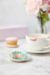 French cake macarons on a marble background