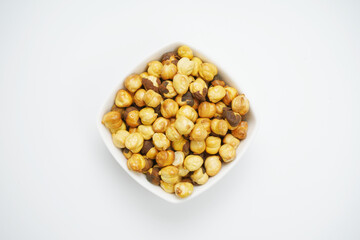 top view of roasted chana isolated on white background with clipping path